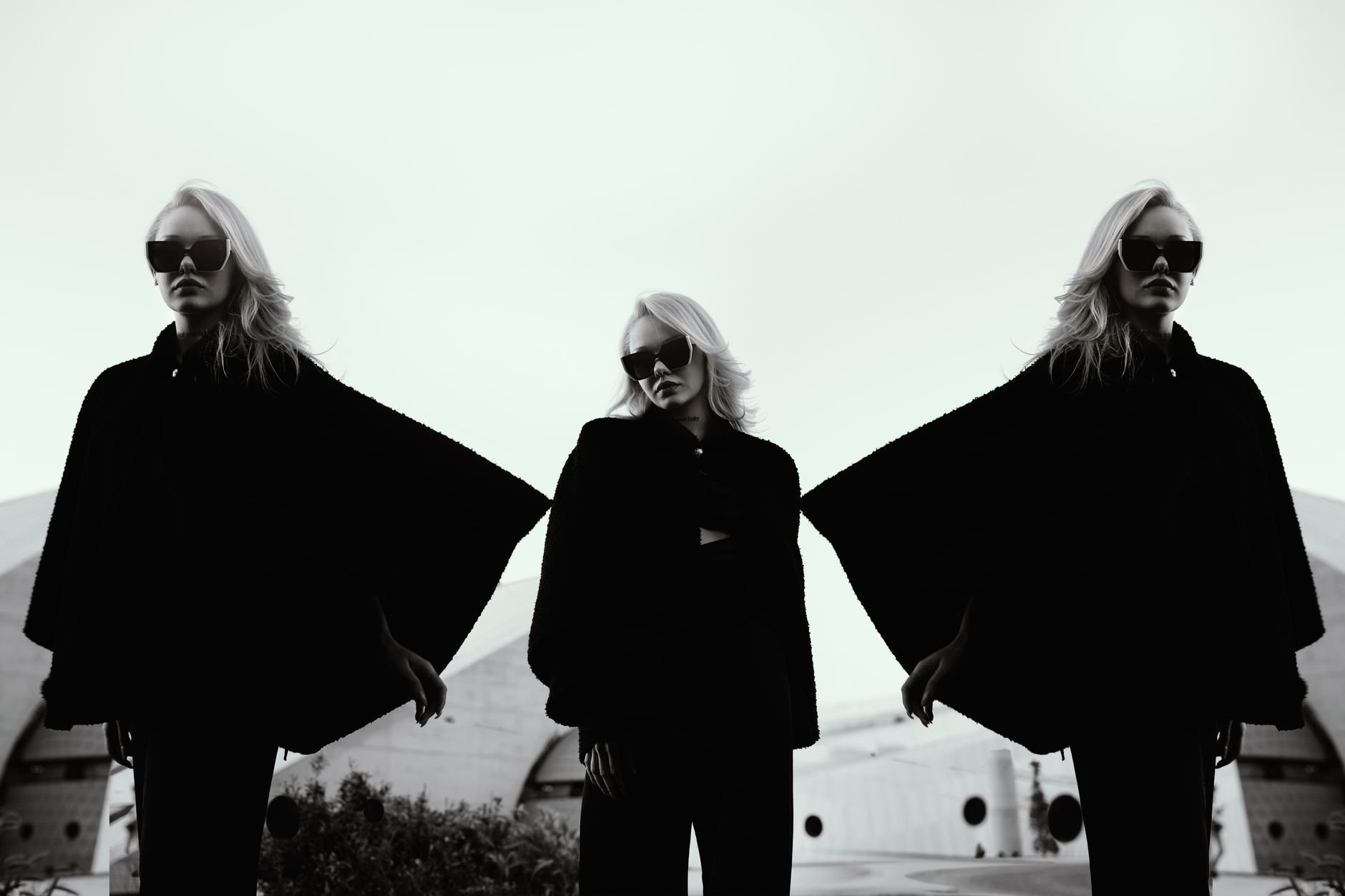 Artistic triple-exposure fashion portrait of a stylish woman wearing sunglasses